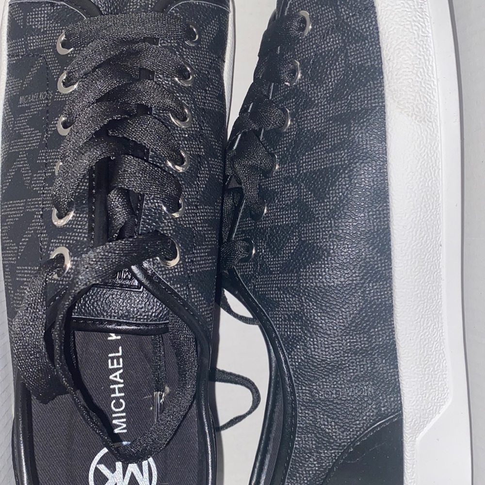 - Brand New Michael Kors 9 1/2 size shoes